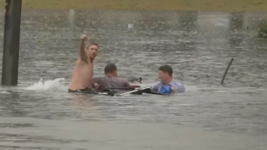 ABC Reporter and Bystander Save Driver as Floodwater Swallows Ute Near Brisbane